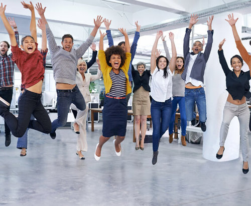 recruitment team jumping up together to celebrate