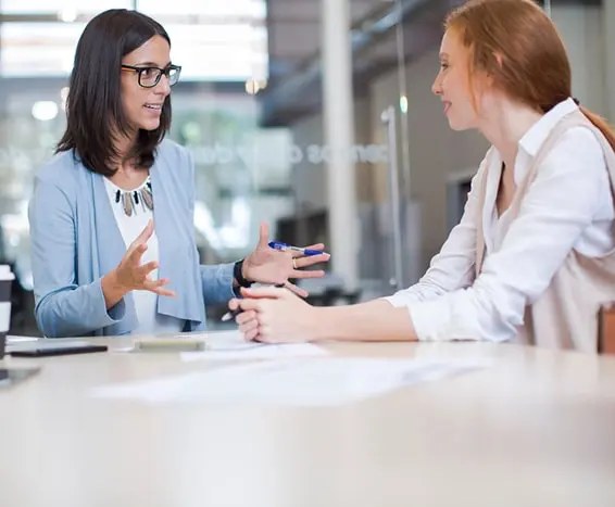 Business woman conducting a Stay Interview with her employee